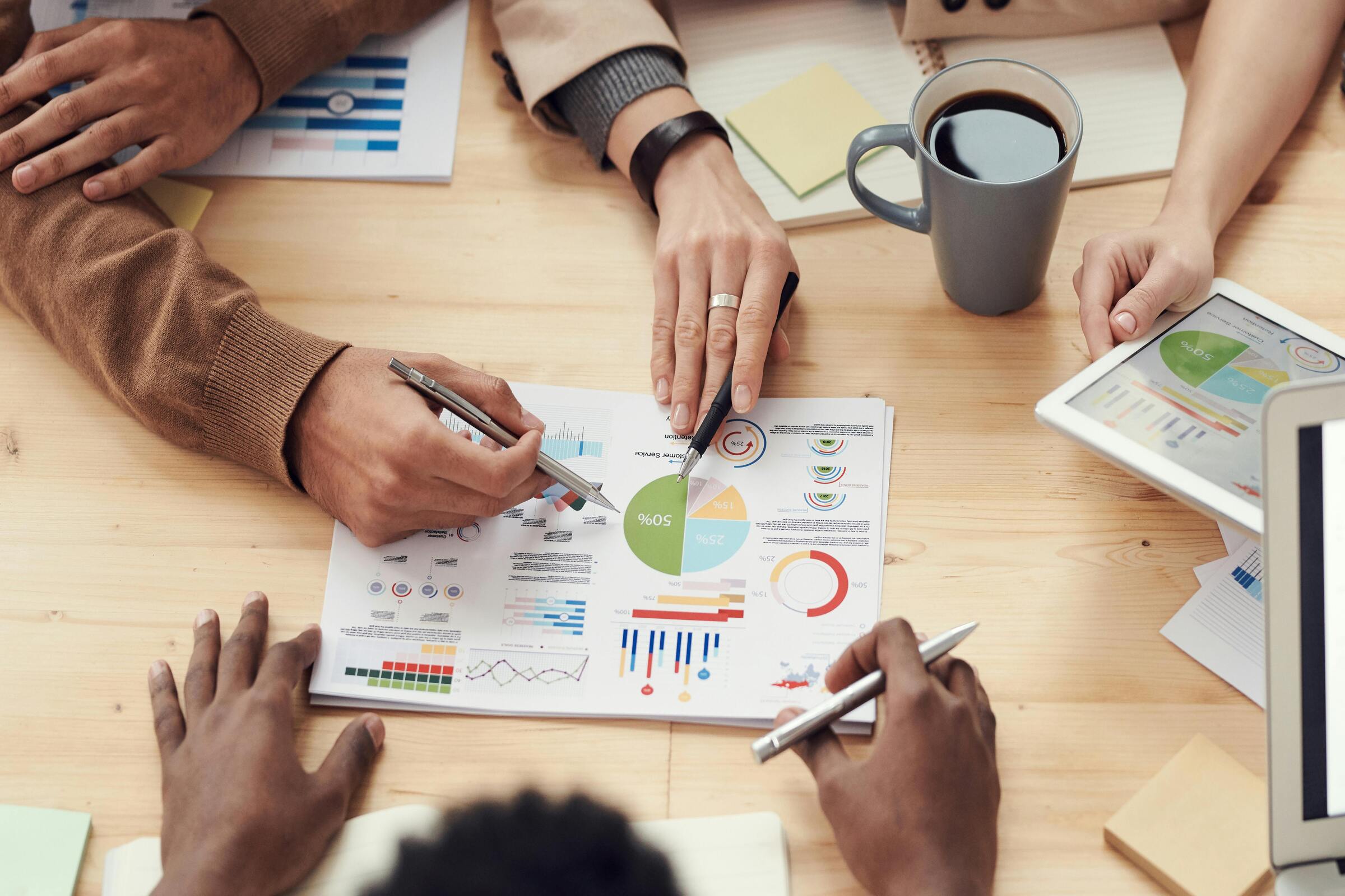 Group of professionals providing strategic consulting for a biotech startup.