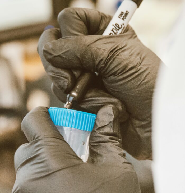 Laboratory team celebrating after receiving research funding.